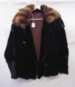 A beaver fur coat with musquash collar a