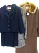A brown wool coat by Warwick House of Ma