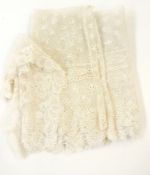 A 19th century cream lace shawl or veil