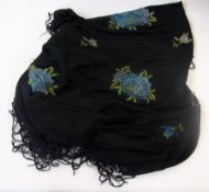 A black crepe Victorian shawl embroidere