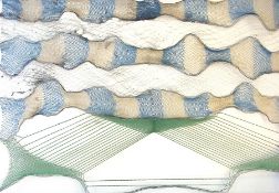 A modern woven textile picture held with