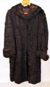 A full length vintage fur coat