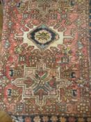 Oriental pattern wool rug with three med