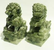 Pair of Chinese carved green jadeite lio