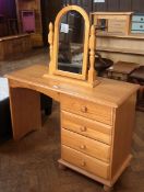 A modern pine dressing table with four s