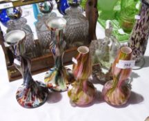 Mottled glass items including two candle