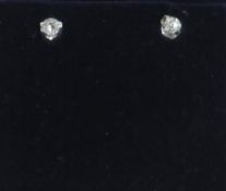 Pair of 18ct gold and diamond earrings i