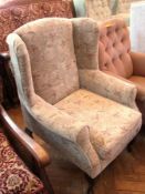 Modern wing armchair upholstered in flor