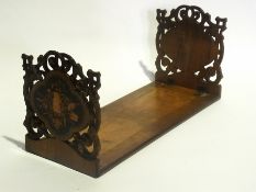 Victorian carved walnut bookstand with i