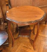 An Edwardian mahogany occasional table w