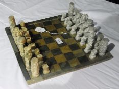 Soapstone chess board with soapstone fig