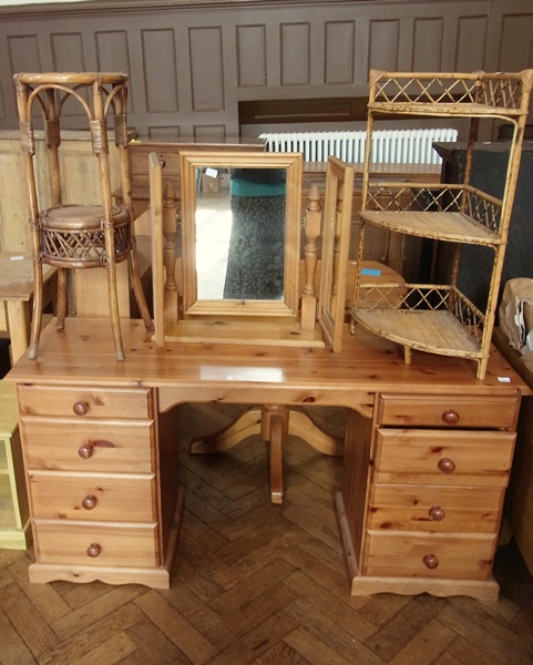 A modern pine kneehole dressing table, a