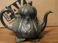 Collection of metal teapots, goblet and