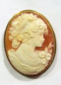 Oval cameo brooch in gold coloured metal