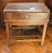 An old fruitwood table, with frieze draw