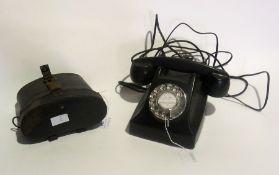 Pair of binoculars, a telephone and a ba