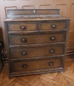 A 20th century stained oak chest of two