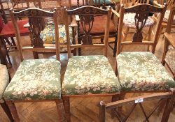 Three Victorian dining chairs with carve