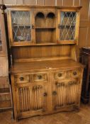 Reproduction oak dresser, with glazed le