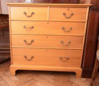 Modern light wood chest of 2 short and 3