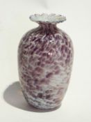 An ovoid-shaped studio glass vase with w