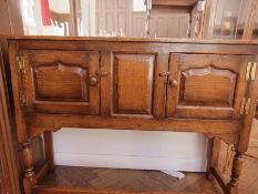 A reproduction oak small dresser with pa