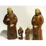 Two large ceramic monk decanters and two