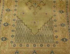 Eastern design wool rug, pale green fiel