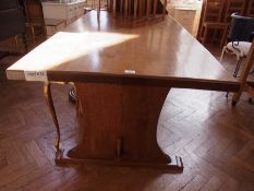 An oak refectory dining table with tress