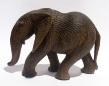 A wooden carved African elephant model a