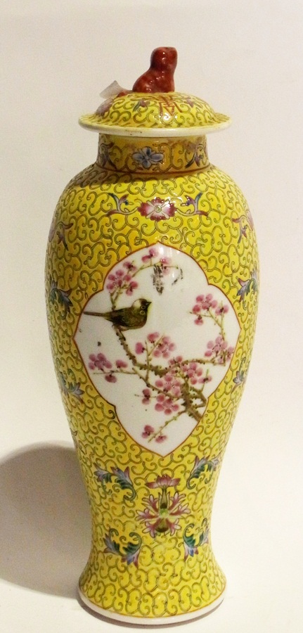 A Chinese yellow ground vase with cover,