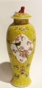 A Chinese yellow ground vase with cover,