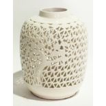 A white Chinese ceramic vase, pierced, s