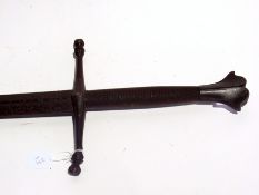 A decorative double-handled sword