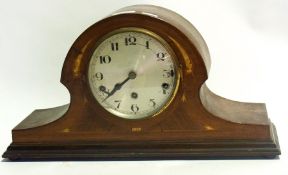 A mantel clock with stringing inlay and