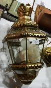 A pendant brass and glass lantern-shape