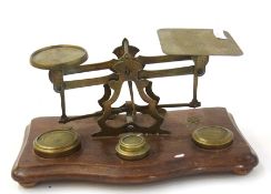 A pair of postal scales and weights