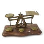 A pair of postal scales and weights