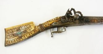 Jezail style musket, decorated with whit