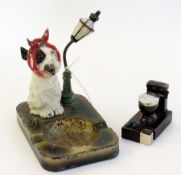 A Metal Ashtray, Dog sat by lamp post wi