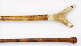 A shepherd's walking stick with whistle