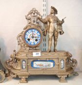 Gilt painted metal and porcelain mantel