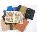 A collection of 11 books of World stamps