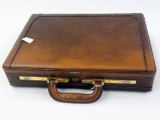 Pigskin attache case with red morocco an