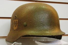 A WWII M40ET62 Waffen SS helmet