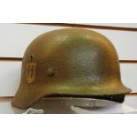 A WWII M40ET62 Waffen SS helmet