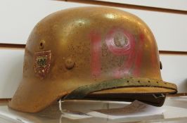 A WWII German army M40 helmet with leath