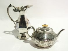 A late Victorian silver plate teapot of compressed oval form with fluted body together with a