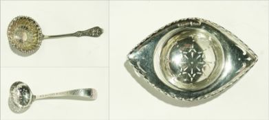 A silver tea strainer, Birmingham 1939,