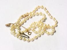 String of cultured pearls, knotted, with